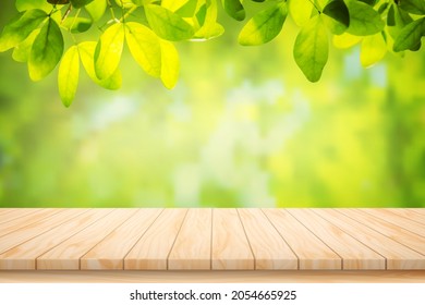 Painted Illustration Vector Wood table floor and beautiful natural green leaf abstract blurred bokeh light background.