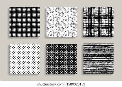 Painted patterns. Seamless tartan, dots, stripes backgrounds. Irregular plaid and checkered hand drawn brush stokes elements. Vector striped graphic prints. Black and white art. Square tiles