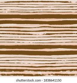 Painterly stripe pattern in earth tones. Trendy seamless background in terra-cotta brown and blush pink.