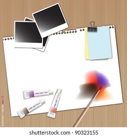 Painting on white paper with photo frame and water color on wood background