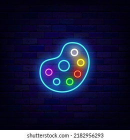 Paints palette neon icon. Back to school concept. Drawing education emblem. Art school logo. Stationery store badge. Glowing advertising on brick wall. Vector stock illustration