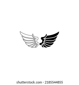 Un par de alas de pájaro. Ángel. Ilustración vectorial del tatuaje. Elemento para el tallado de madera.