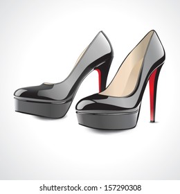 pair of black high-heeled shoes