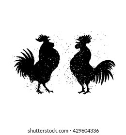 Pair of black roosters are looking at each other. Happy new year 2017 zodiac. Greeting card. Vector. Imitation of hand drawing or painting of roosters silhouette with Chinese calligraphy ink.