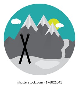 Pair of cross skis in snow with mountain