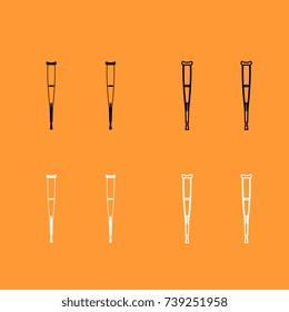 Pair of crutches black and white set icon .