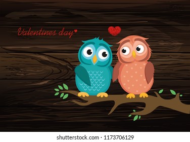 A pair of cute owlets sitting on a branch. Owls in love hearts around them. Greeting card for Valentine's Day. Vector illustration on wooden background.