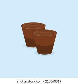 a pair of delicious chocolates on a blue background