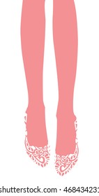 a pair of feet clad in ballet flats