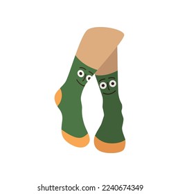 Pair of female feet in green socks with face. Vector illustration underwear. Cartoon warm wool or cotton clothes for legs with funny pattern isolated on white. Accessory, footwear, fashion concept