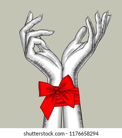 Pair of female hands bound by a red ribbon with a bow. Vintage engraving stylized drawing. Vector illustration
