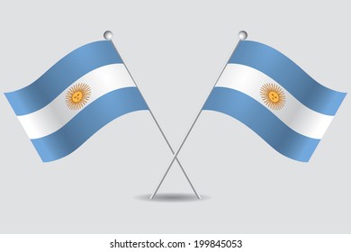 a pair of flags of argentina in grey background