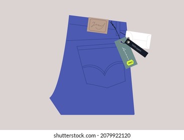 A pair of folded blue jeans with a label tag, casual clothes