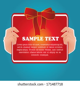 a pair of hands with a red advertisement and text