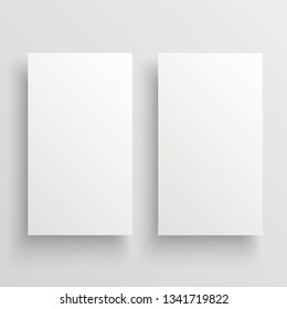 Pair isolated of blank paper brochures with soft shadows.