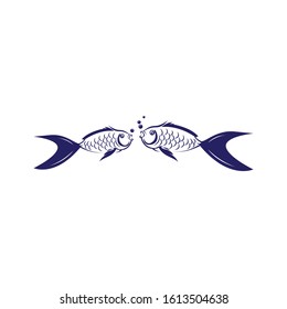 A pair of ornamental fish are swimming
