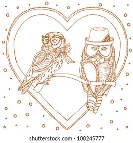 pair of owls in heart frame