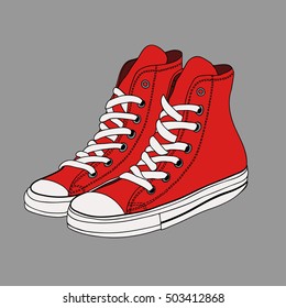 Pair of red gumshoes. Teenage school street wear.side view sneakers