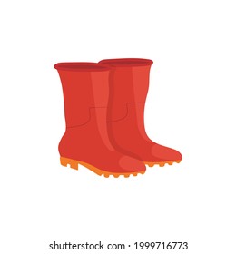 un par de botas de goma rojas con suela amarilla en el aislamiento de fondo blanco