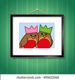 Pair of Robin Red Breasts wearing Paper Party Hats in Picture Frame Hanging on Green Wallpaper Background