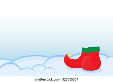 A pair of shoes elf standing on the snow. Greeting Card Merry Christmas with a place for your text