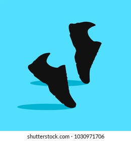pair of shoes on blue background