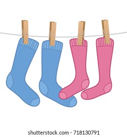 Pair of socks hanging as a love symbol on clothes line - blue for the man, pink for the woman. Isolated vector comic illustration on white background.