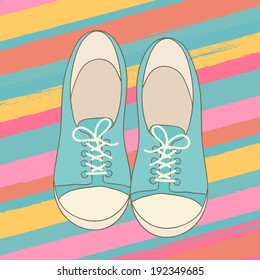 Pair of vector blue hipster gumshoes on striped background
