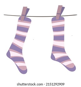 Pair of warm wool striped socks hanging on the rope. Winter woolen feet clothes. Trendy hosiery design. Hand-drawn vector illustration isolated on white background