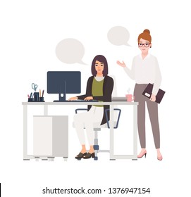 Pair of women working at office together. Female clerks dressed in smart clothes sitting in chair and standing at desk with computer and talking to each other. Flat cartoon vector illustration.