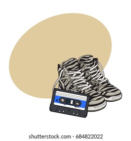 Pair of zebra sneakers and audio tape from 90s, retro style disco attributes, sketch vector illustration with space for text. Retro style sneakers and magnetic audio tape from nineties
