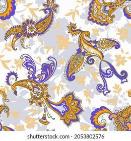 Paisley animal background. Seamless pattern with fantasy birds. Firebirds in Paisley style. Folk Oriental motif.