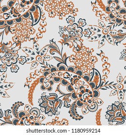 Paisley ethnic seamless pattern with floral elements.