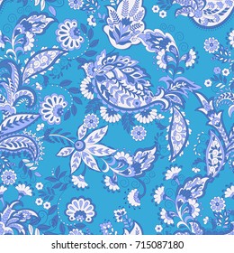 Paisley ethnic seamless pattern with floral elements.