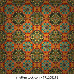 Paisley floral oriental ethnic seamless pattern. Vector Arabic ornament in blue, pink and orange colors. Ornamental motifs of the Indian fabric patterns.