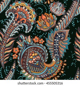 Paisley floral seamless pattern. Dark backdrop with indian decorative elements