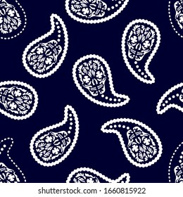 Paisley pattern with skulls. Graphic elements on dark background. Template for scarves, shirts, cards, gift wrappings.