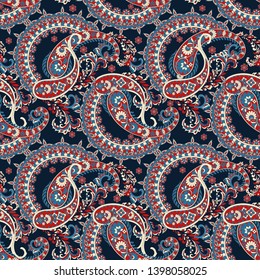 Paisley seamless pattern with flowers in indian style. 