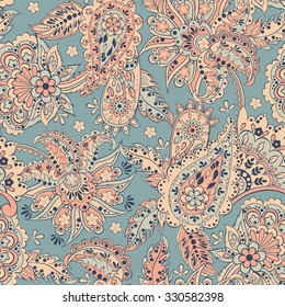 Paisley seamless pattern with flowers in indian style. Floral vector background