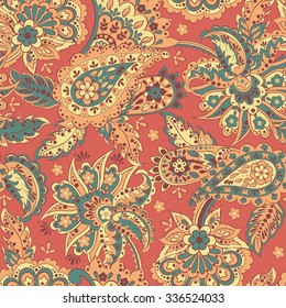 Paisley seamless pattern with flowers in indian style. Floral vector background
