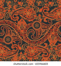 Paisley seamless pattern with flowers in indian style. Floral vector background