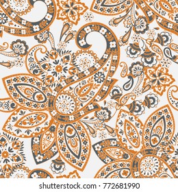 Paisley seamless pattern with flowers in indian style. 
