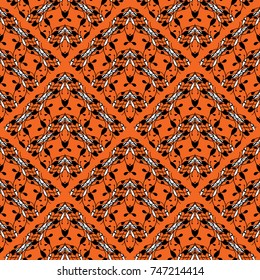 Paisley seamless pattern. Vector floral orange ethnic background with black white oriental paisley flowers, arabesque ornaments. Oriental design. Ornate tribal wallpaper. Ornamental fabric texture