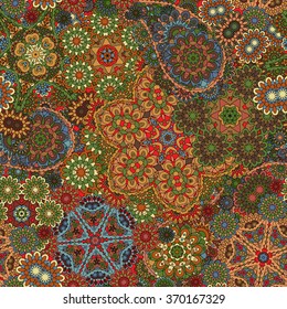 Paisley seamless pattern. Vintage red brown gold background in batik style