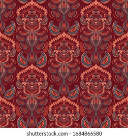 Paisley seamless traditional pattern in vector. Multi-colored red-orange fabric ornament