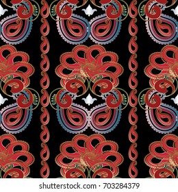 Paisley striped seamless pattern. Black floral background wallpaper illustration with red gold blue paisley flowers, vertical border stripes and bright ethnic ornaments. Vector endless luxury texture 