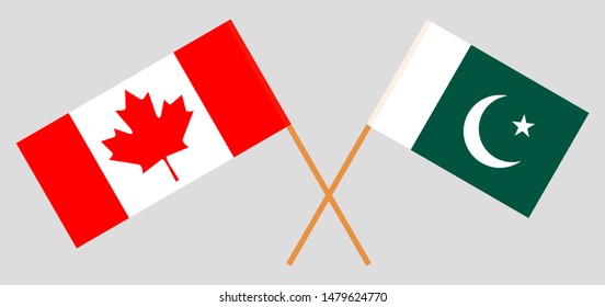 Pakistan and Canada. Crossed Pakistani and Canadian flags