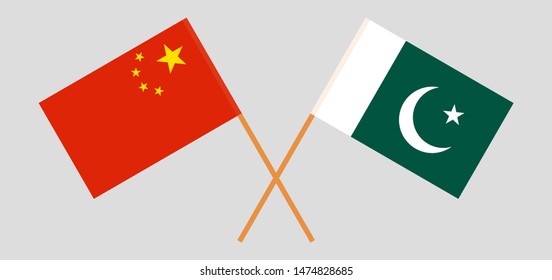 Pakistan and China. Crossed Pakistani and Chinese flags