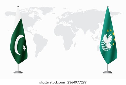 Pakistan and Macau flags for official meeting against background of world map.
