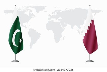 Pakistan and Qatar flags for official meeting against background of world map.